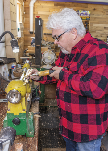 Melvin Faris uses a lathe to form one of his Badlands Shaving Co. products.  PHOTOS BY NDAREC/JOHN KARY