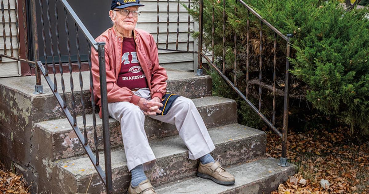 At 100 years old, WWII veteran Bob Hunter still lives in the Maddock home he built decades ago. An American flag flies in his yard, next to the parked car he still drives.