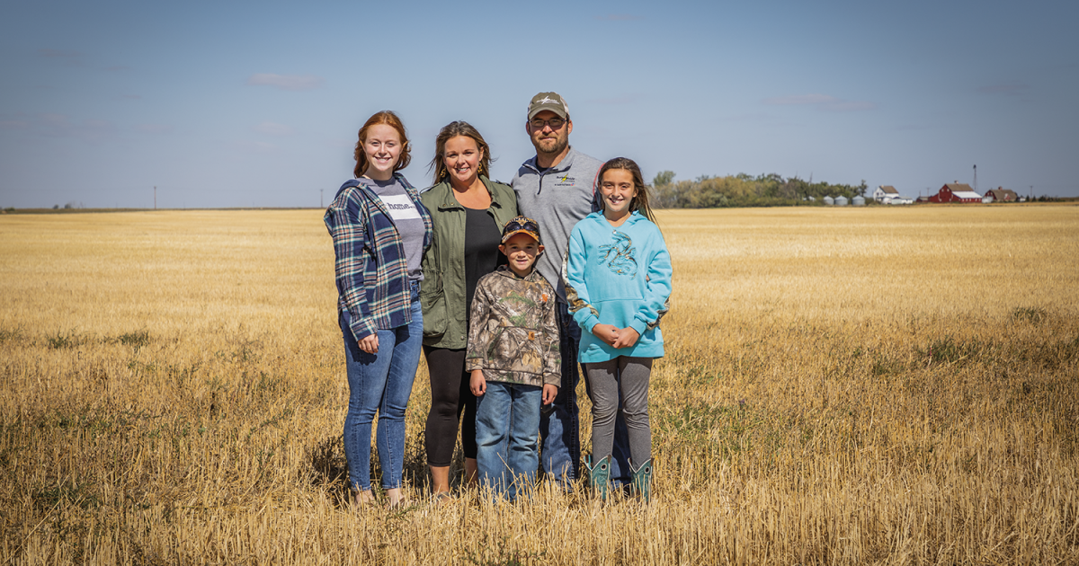  Burke-Divide Electric Cooperative Operations Supervisor Eric Sieg and his wife, Candace, spend a lot of time outdoors with their three children, from left, Isabel, 18, Emmit, 7, and Avery, 10. Photo by NDAREC/Liza Kessel
