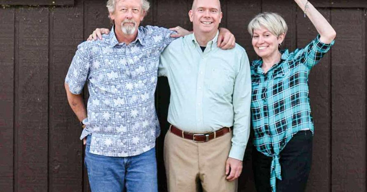 Photographer Wayne Gudmundson, left, and authors Steven Bolduc and K. Amy Phillips collaborated to produce the book, “The Prairie Post Office: Enlarging the Common Life in Rural North Dakota.”