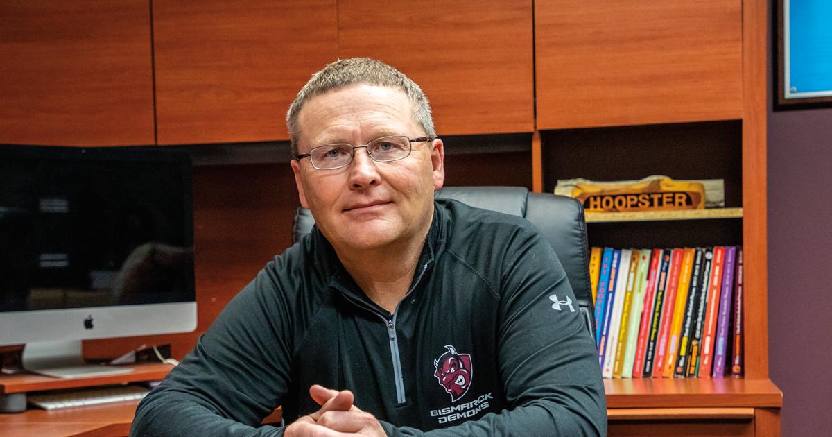 Perry Hanson carries on his father’s legacy as editor of North Dakota’s basketball bible, “The Hoopster.” Photo by NDAREC/Liza Kessel