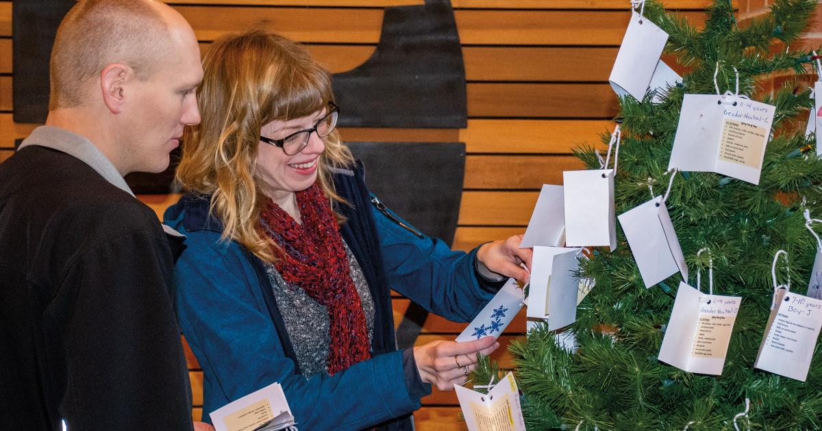 o balance out their Christmas shopping for five nephews, Cass County Electric Cooperative members Josh and Carrie Herberg search for girls to buy gifts for as part of their church’s annual Giving Tree of Hope program.