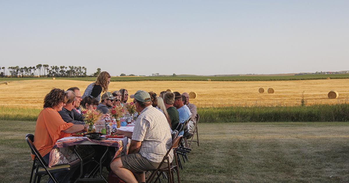 Diners enjoy food and conversation at gardendwellers FARM’s annual farm-to-table dinner. Courtesy PHOTO