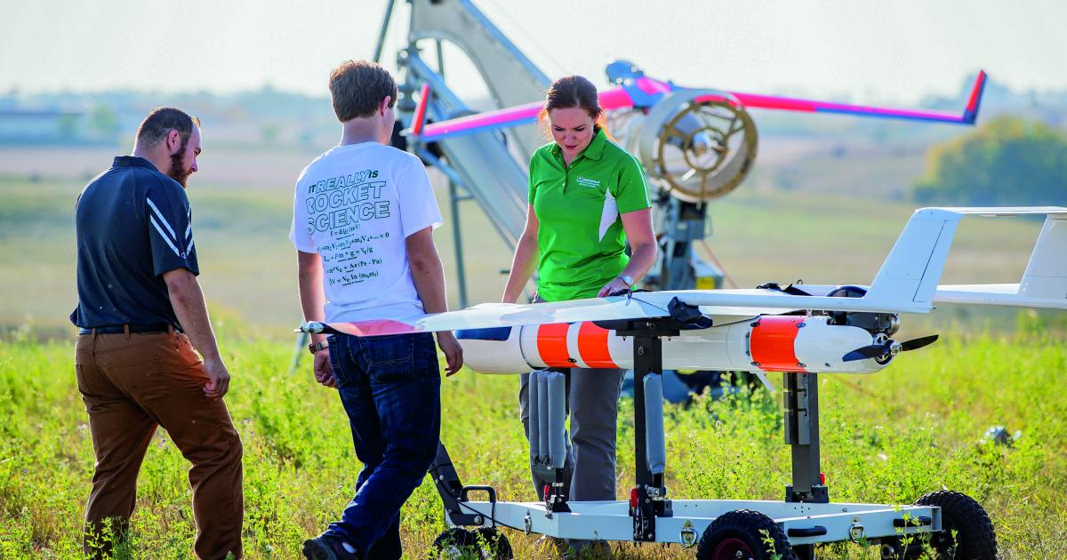 PHOTO BY SHAWNA SCHILL/UND TODAY The University of North Dakota, along with research partners from Harris Corporation and the Northern Plains Unmanned Aircraft Systems Test Site, continues research in better utilizing UAS. A major industry milestone was reached with the first-ever test flights over a specially developed UAS network of technologies that opens the skies for broad commercial use of drones.