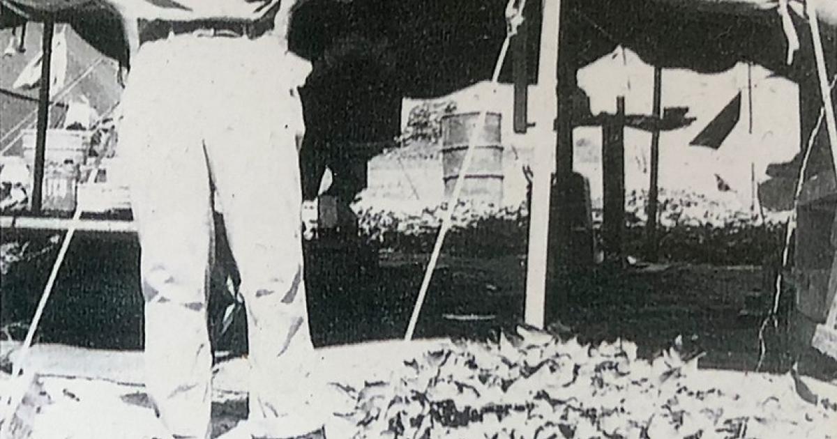 A young Bob Hunter is shown outside his U.S. Army barber tent, where he cut hair and gave shaves with straight-edged razors to servicemen, on the island of Ie Shima, off the coast of Okinawa, Japan, during WWII. Courtesy Photo