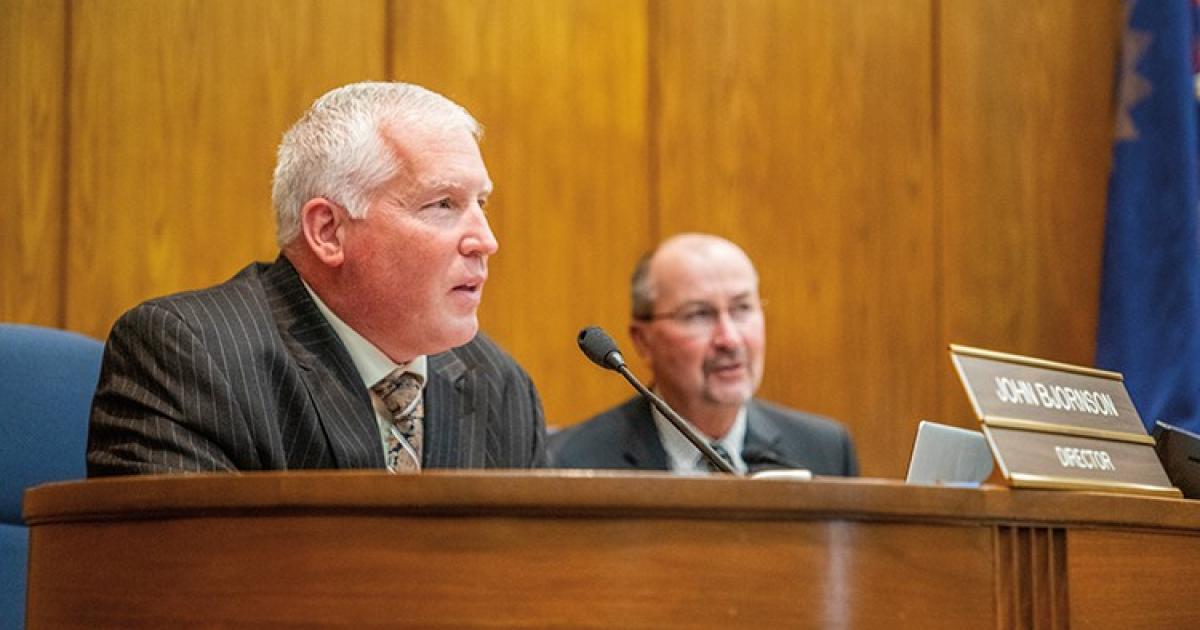 John Bjornson, foreground, leads preparations for the 2021 legislative session as director of N.D. Legislative Council. He works closely with legislative leaders, including House Majority Leader Chet Pollert, background, to plan for contingencies and develop protocols as the Legislature adapts to changes amid the COVID-19 pandemic. Photo by NDAREC/Liza Kessel