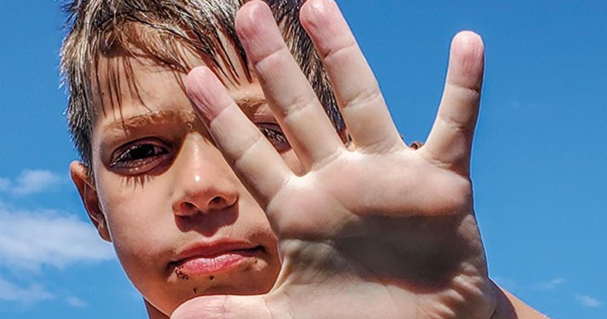 Roxanne Henke’s grandson, Axel, shows her the “stop” sign. Courtesy photo