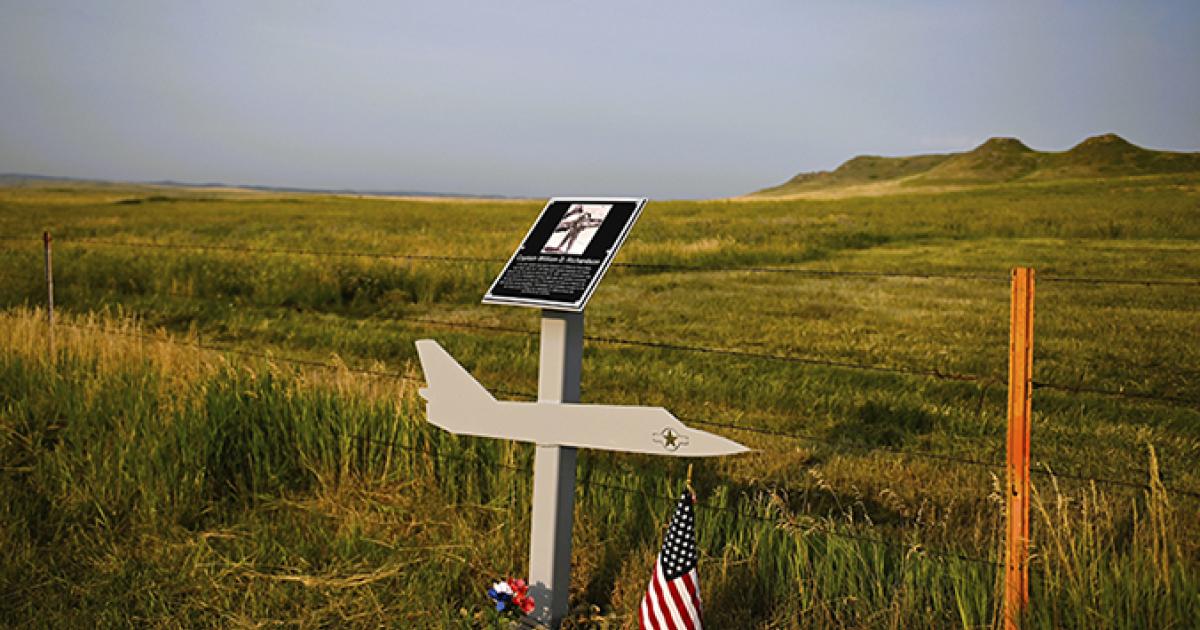 A plaque and fighter plane cutout, created by Flasher High School students, now  memorializes the service of Capt. William Richardson, whose plane crashed in 1963 between Flasher and Raleigh.