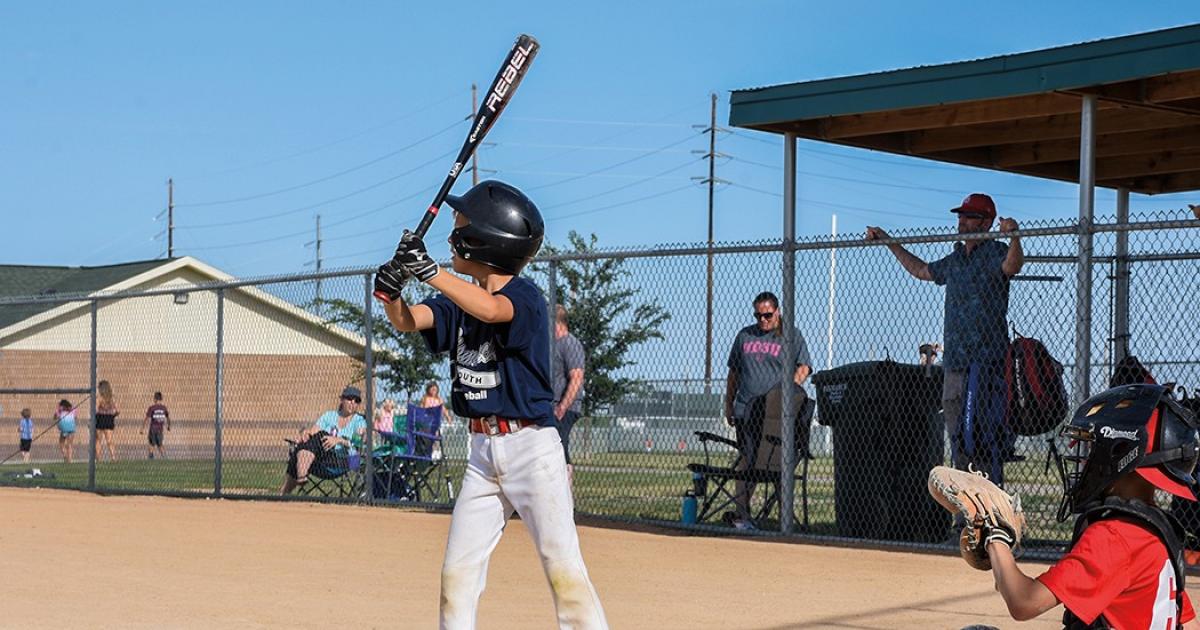 John Devney, 10, is ready to swing for the fences and play baseball again this summer. Courtesy Photo