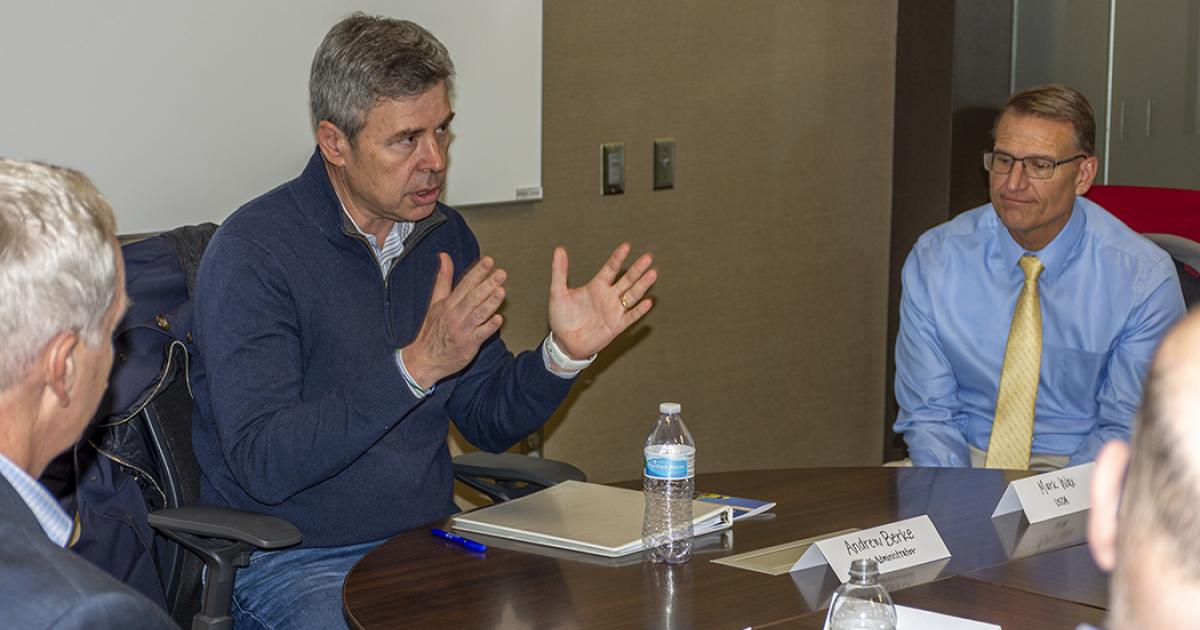 Andrew Berke, U.S. Department of Agriculture Rural Utilities Service administrator, talks with North Dakota electric cooperative leaders at a Dec. 4, 2023, meeting in Fargo.