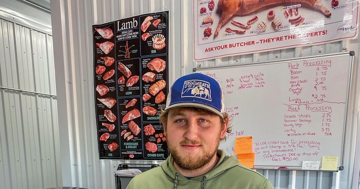Jayden Krivoruchka, 22, shows the variety of bison products available at his business, 701 Meats.