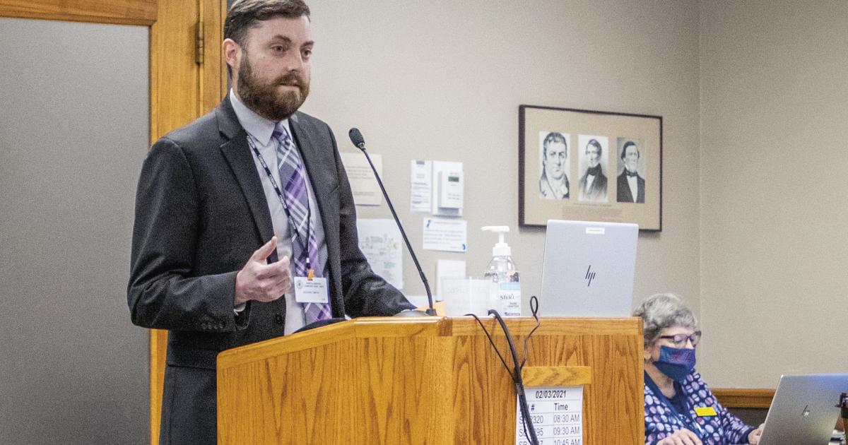 Zac Smith, NDAREC communications and government relations director (top), and Paul Matthys, Cass County Electric Cooperative vice president of member and energy services, testify Feb. 3 before the Senate Industry, Business and Labor Committee. Photos By NDAREC/Liza Kessel
