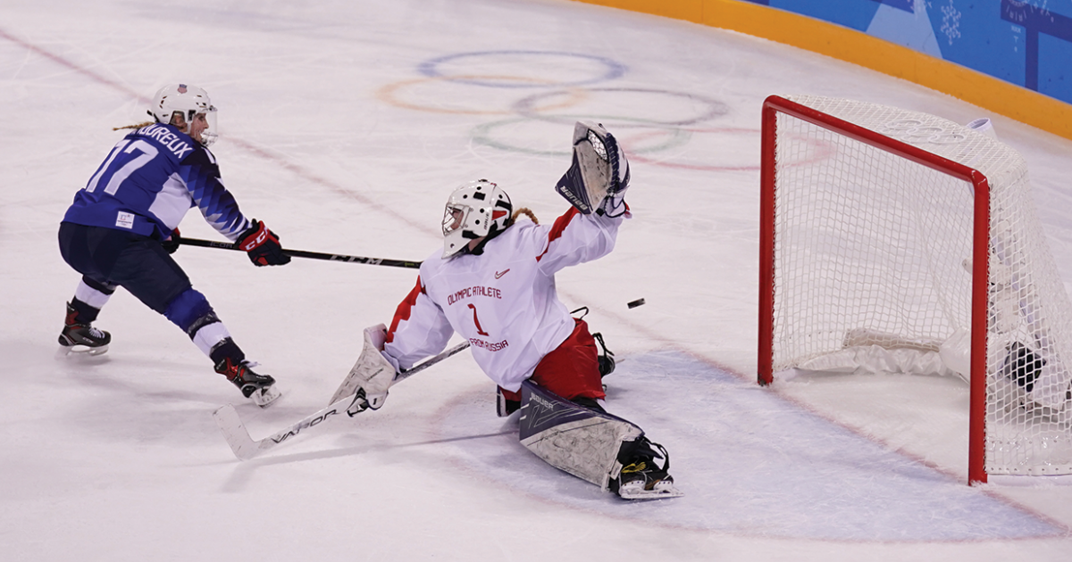 Jocelyne Lamoureux-Morando scores during a preliminary game at the 2018 Olympics.