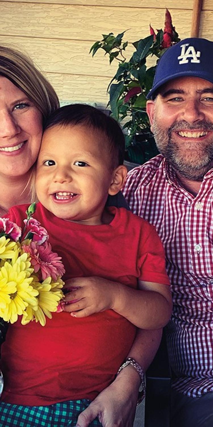The Oban family is all smiles in a recent photo.