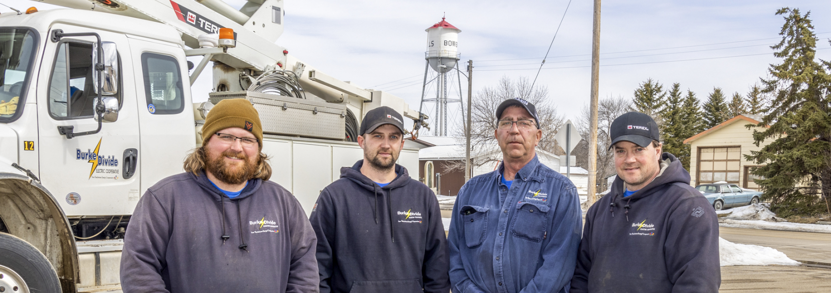 Terry Knutson, Kyle Helmers, Joe Thomas and Jason Bruner have been the faces of  Burke-Divide Electric Cooperative's Kenmare line crew.